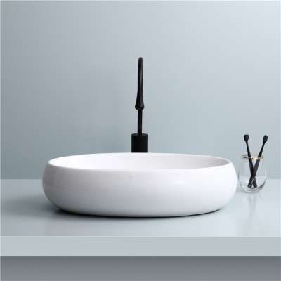 Popular modern porcelain wash basin  sanitary ware ceramic water counter top basin