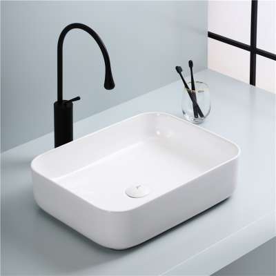 Chaozhou new design elegant white rectangular shape table top ceramic bathroom sink countertop wash basin for bathroom